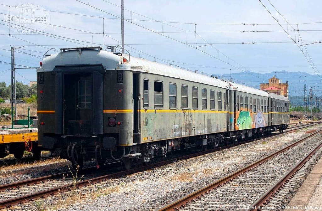 Photograph of passenger cars AA 6018, 6034, and 6037.